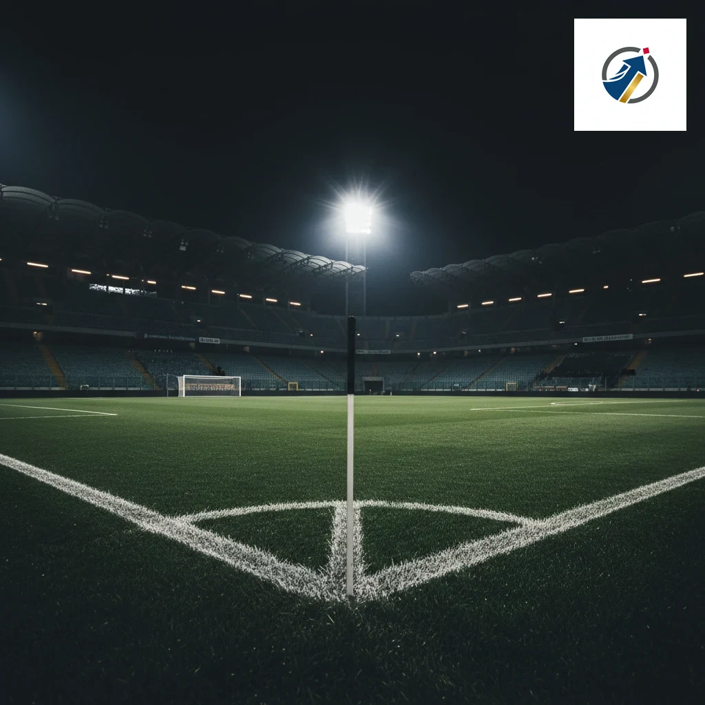 Campo da calcio illuminato dai riflettori con tabellone dei dati statistici